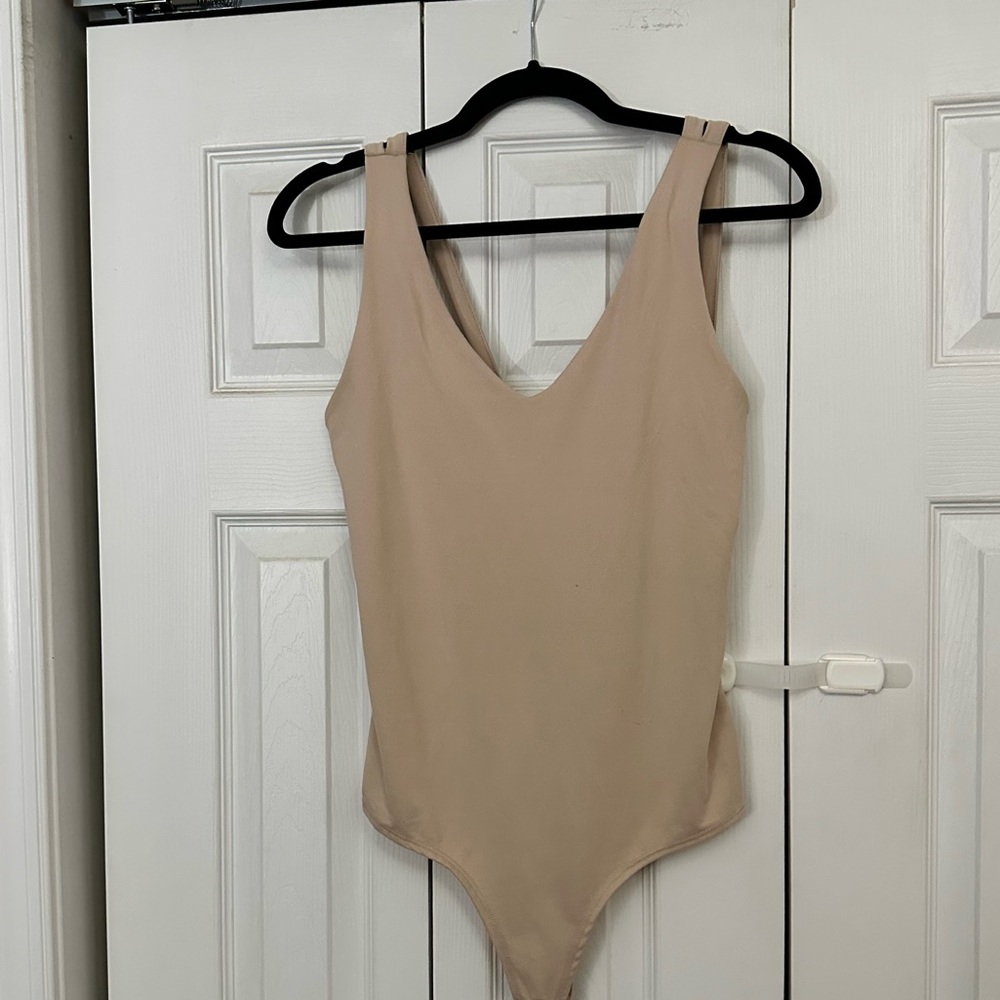 Nude open back bodysuit